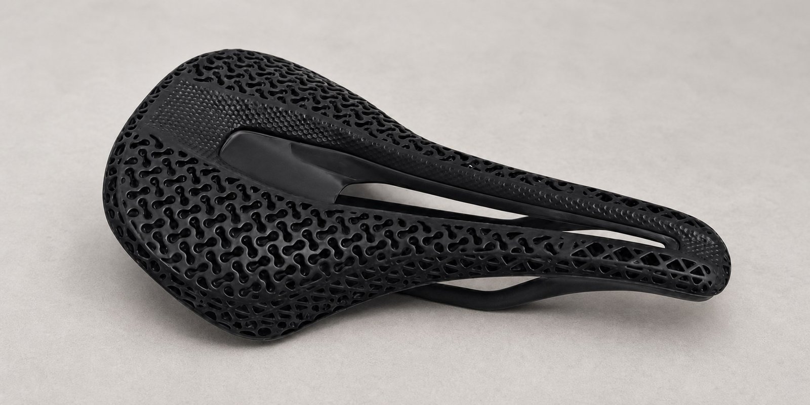 Black 3D printed lattice bicycle saddle produced by an OEM bicycle saddle manufacturer